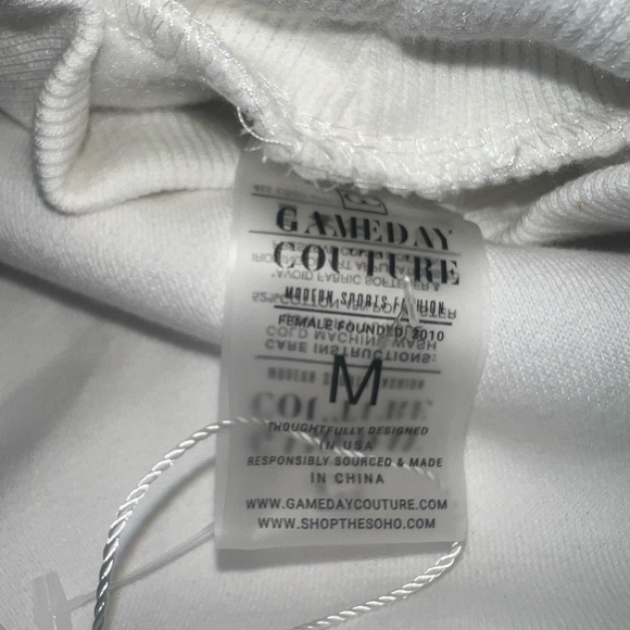 Classic White Turtleneck Sweater with Maroon Logo - Picture 9 of 16